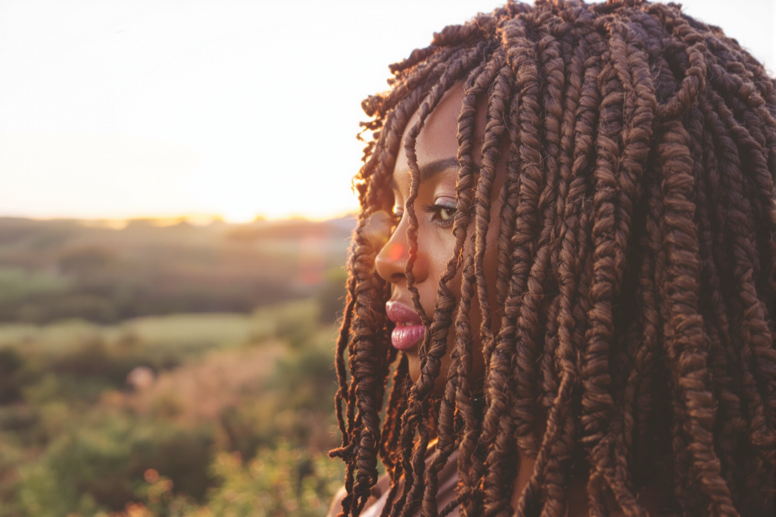 Close-up of boho knotless braids with curls woven through