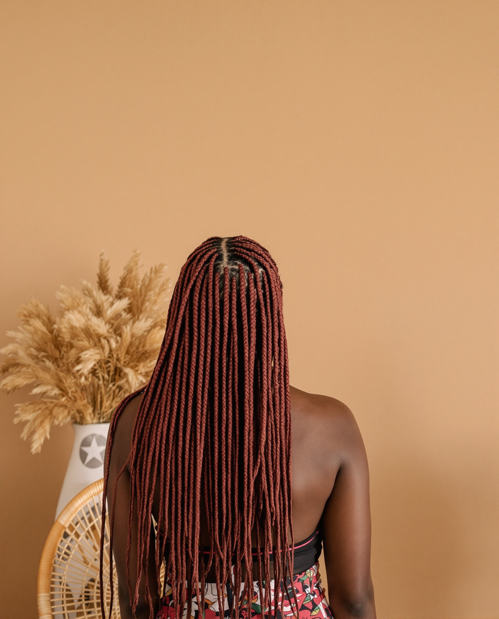 Burgundy Senegalese twists, seen from behind